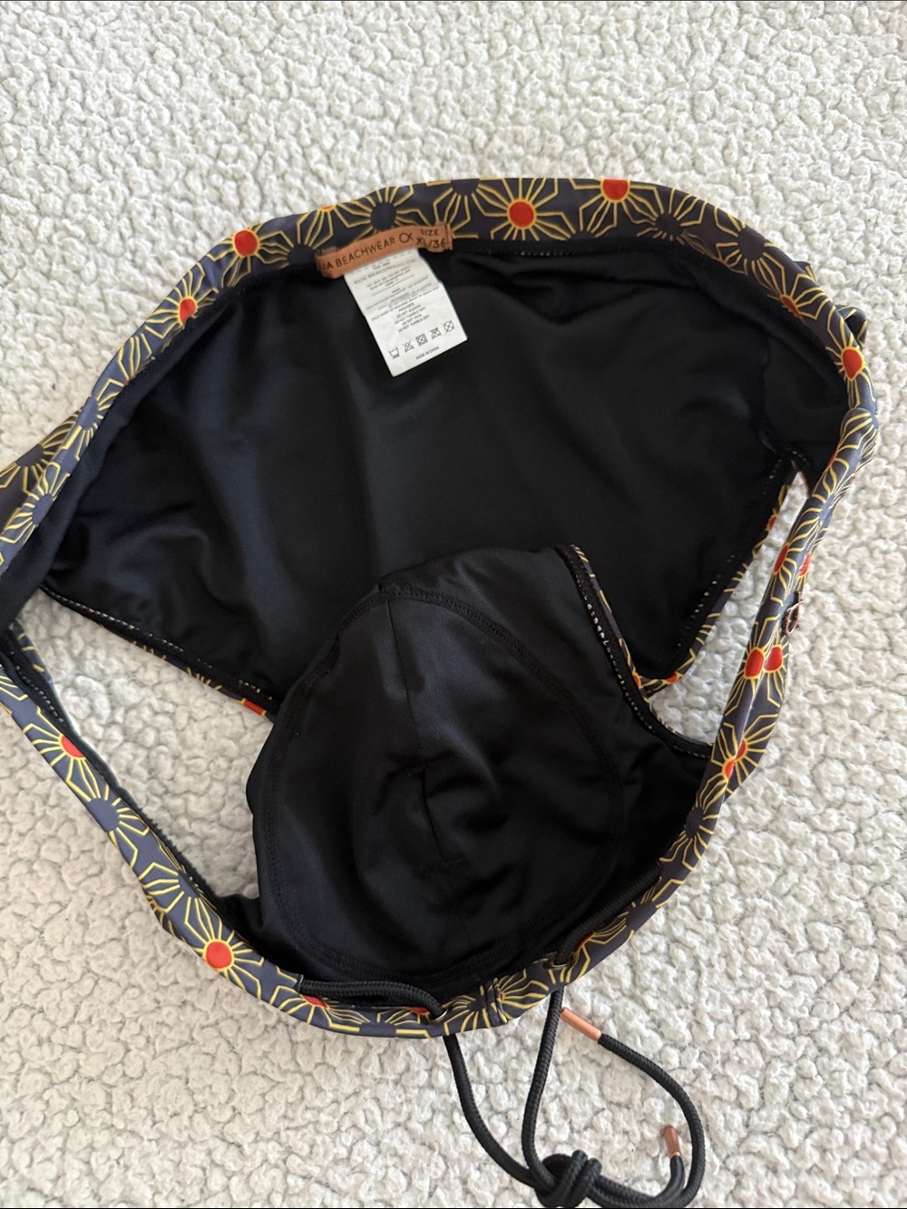 Men's Black Swim Briefs with Orange Starburst Print - Picture 5 of 6